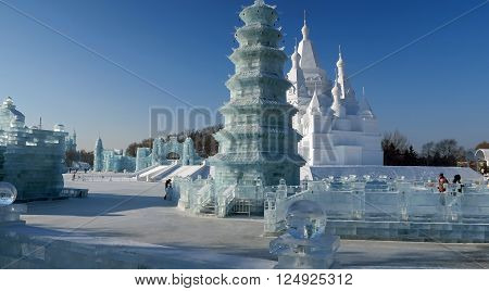 HARBIN CHINA - JANUARY 15 2016: Local life during the 32nd Harbin Ice Festival. The main attraction is the Harbin Ice and Snow World which covers more than 750000 square meters.