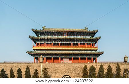 Beijing, China at the Zhengyangmen Gatehouse in Tiananmen Square. Beautiful historical building at sunset.
