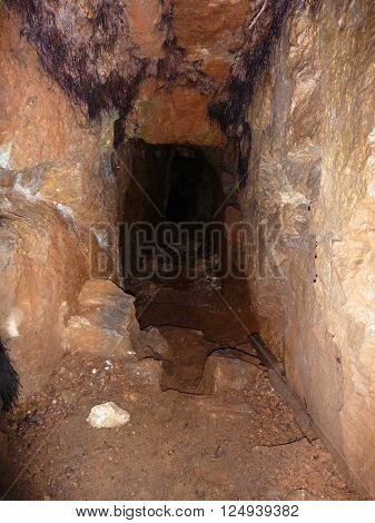 an underground hole in former minimg locality