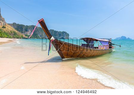 Traditional long-tail boat on the Ao Nang beach Krabi Thailand