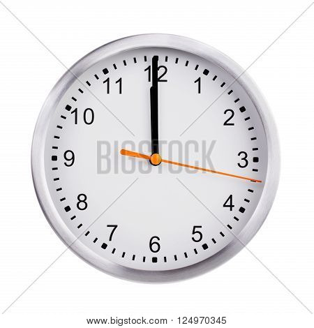 Noon on the dial of the large round clock