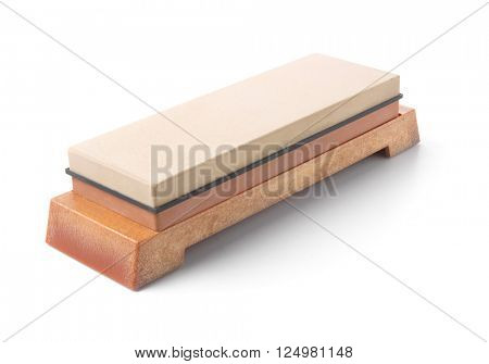 Japanese grinding stone on rest. Isolated on white.