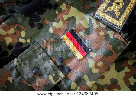 HANNOVER - GERMANY - APRIL 2016: german flag and chief petty officer badge on german military jacket in april 2016