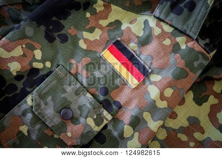HANNOVER - GERMANY- APRIL 2016: German flag on german military jacket texture in april 2016