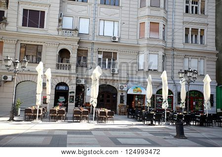 Novi Sad, Serbia - april 3. 2016 -Katolicka Porta in Novi Sad in the centre of Novi Sad - back yard. Streets with old houses of the old town wtih many caffe shops.