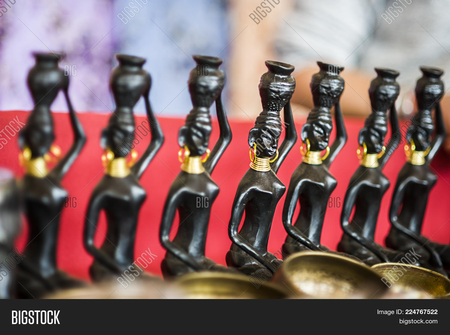 black wooden dolls