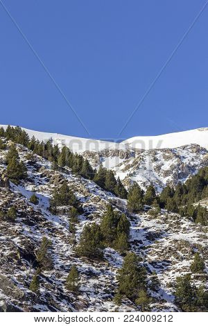 Winter pyrenes landscape near Village of Canillo. Principality of Andorra.