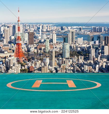 Tokyo Tower with skyline in Tokyo Japan with helipad
