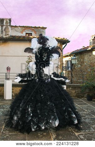 Elegant Woman With Carnival Costume In Black And White At Sunset