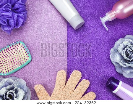 Cosmetic objects on color background with copy space, cream, soothing, soap, spread out around the perimeter, color trend 2018.