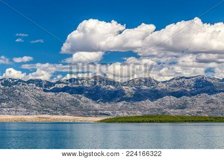 The landscape with sea bay below The Velebit Mountains with the national park Paklenica, Croatia, Europe.