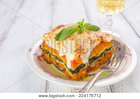 Slice of Pumpkin and Spinach Lasagne close up