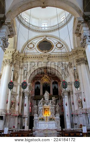 VENICE, ITALY - JUNE 22: Interior of Basilica di Santa Maria della Salute on Punta della Dogana on June 22, 2015 in Venice, Italy. This church was commisioned by Venice's plague survivors as thanks for salvation.