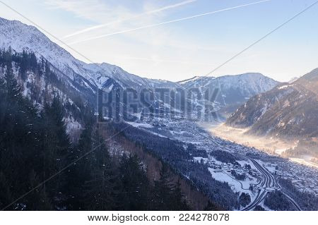 The Mont Blanc and the Valley near Chamonix de Mont Blanc, as seen from the Cable Car to the Aiguille du Midi