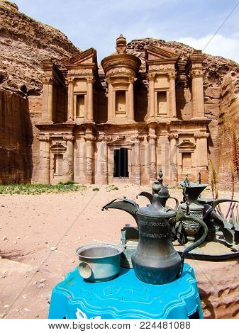 bedouin jars and jugs in front of  