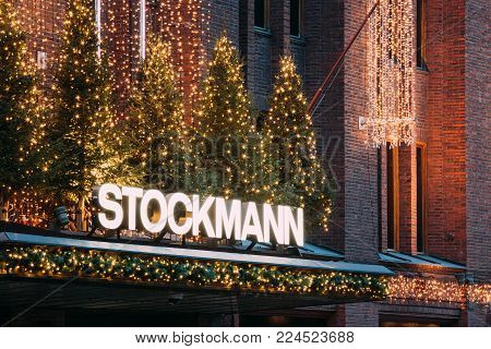 Helsinki, Finland - December 11, 2016: Sign Signboard Title Logotype Of Stockmann Department Store In Evening Christmas Xmas New Year Festive Illuminations. Finnish Company Of Retail Trade