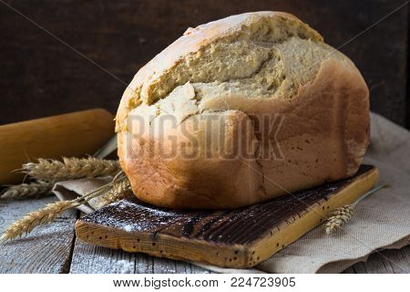 Fresh Fragrant Bread On The Table. Food Concept. Bakery, Crusty Loaves Of Bread And Buns. Assortment