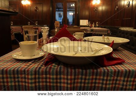 Emptied dinner table after meal in retaurant