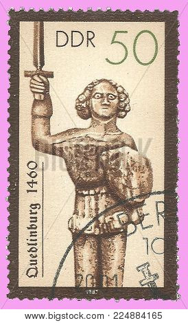Germany - circa 1987: Stamp printed by Germany, Color edition on Sculpture, shows Historical Monument Pillars Roland in Quedlinburg, circa 1987
