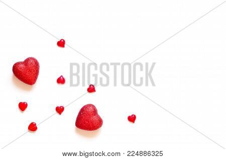 Valentine day background with red hearts, top view.