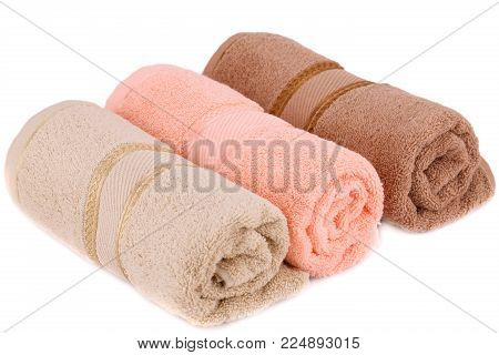 Rolled towels isolated on a white background.