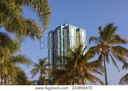Lanzarote, Spain - January 20th 2018: A View Of The Arrecife Gran Hotel & Spa Through The Palm Trees