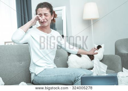 Young Red-haired Woman Feeling Awful Having Allergy To Cats