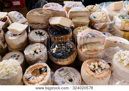 Cangas De Onis, Spain - March 31, 2019: Assortment Of Traditional Asturian Cheeses Ready To Taste In