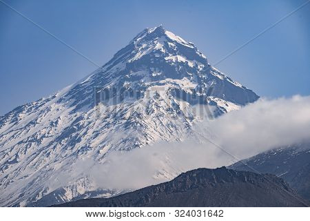 View On Kamen Volcano, Active Klyuchevskoy Volcano And Active Bezymianny Volcano.