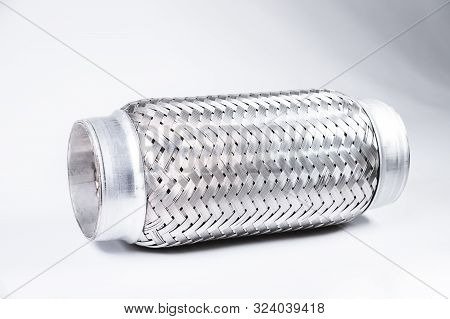 Full-contrast Image Flexible Connection To The Exhaust System Of A Passenger Car On A Gray Gradient 