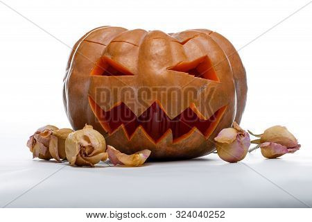 Photo Of Halloween Pumpkin. Scary Jack Olantern Isolated On White