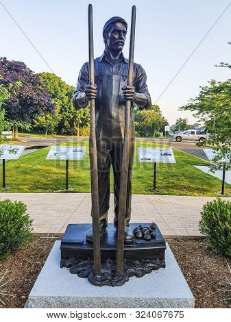 Babylon, New York, Usa - 2 July 2018: Babylon Villages Bayman Statue Dedicated To The Men Who Clamed