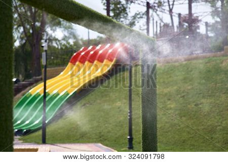Outdoor Air Conditioning Climate In Hot Weather. Street Gate Climate Control In The Waterpark. Aeros