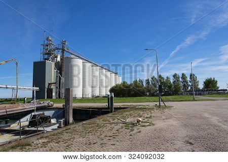 Walsoorden, Netherlands, September 15, 2019, Barley Silos With Loading And Unloading Facilities And 