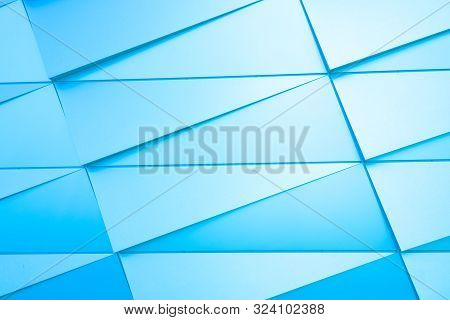 Abstract Geometric Light Blue Textured Background. Wall With Lines And Triangle Shapes