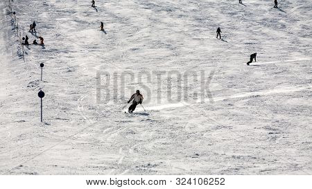 Stubai, Austria - November 2, 2011: Snowboarders And Skiers Riding On The Slopes Of The Stubaier Gle