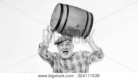 Fermentation Product. Retro Man With A Beer Barrel. Barman. Wooden Barrel. Oktoberfest Festival. Bre
