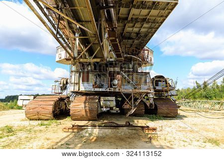 Old Rusty Multi Bucket Excavator, Giant Stacker, Absetzer In Sandy Career.