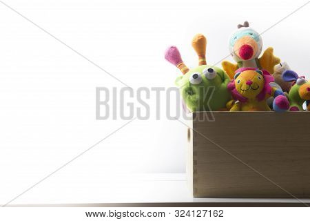 Toys Collection In Box Isolated On White Background. Donatation. Copy Space For Text
