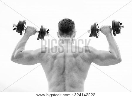 Man Sportsman Weightlifting. Steroids. Fitness And Sport Equipment. Muscular Back Man Exercising In 