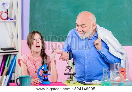 Little Girl With Man Tutor Study Science. Teacher Help Schoolgirl. Back To School. School Lesson. Ex