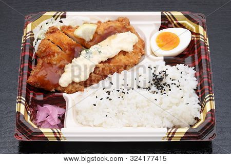Japanese Chikin Bento Lunch On Black Background