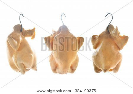 Boiled Whole Chicken(capon) Hanged At The Food Vendor Isolated On White.