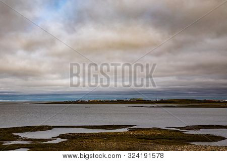 Beaufort Sea Or Arctic Ocean Landscape At Tuktoyaktuk, An Inuvialuit Community In Northwest Territor