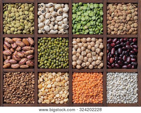 Legumes And Cereal Bood Background : Lentils Haricot Beans Chickpea Pea In Wooden Box Close-up
