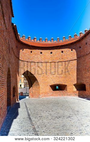 Warsaw, Poland Barbican Or Barbakan Semicircular Fortified Xvi Century Outpost With The Defense Wall
