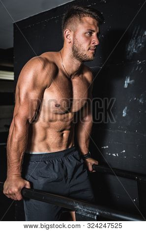Dip Training, Young Strong Sweaty Muscular Fit Man Doing Dip Cross Workout Training In The Gym For T