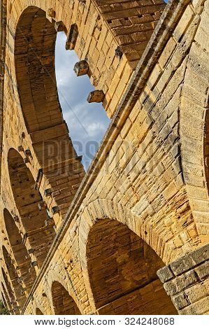 Remoulins, France, September 20, 2019 : The Pont Du Gard, The Highest Roman Aqueduct Bridge, And One