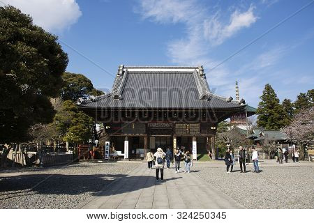 Japanese People And Foreign Travelers Walking Visit And Praying God Angel In Great Pagoda Of Naritas