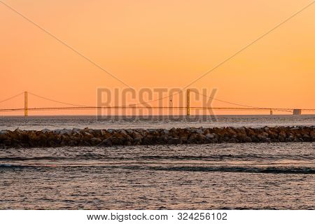 Mackinac Island Mi /usa - July 9th 2016: The Mackinac Bridge As The Sun Sets From Mackinac Island